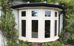 Cream uPVC bow window installation