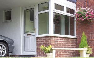 White uPVC entrance door and veranda