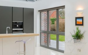 Large grey flush sash aluminium windows interior view