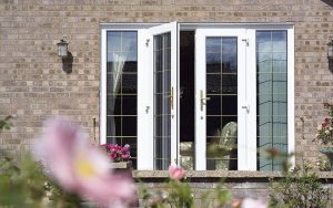 White uPVC french door with leaded windows
