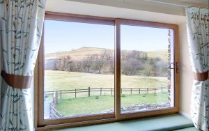 Oak effect uPVC patio door installation