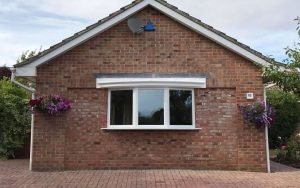 Small white uPVC bow window