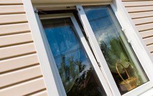 Open white uPVC tilt and turn window