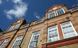 White uPVC vertical sliding windows installation