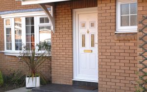 White uPVC residential entrance door